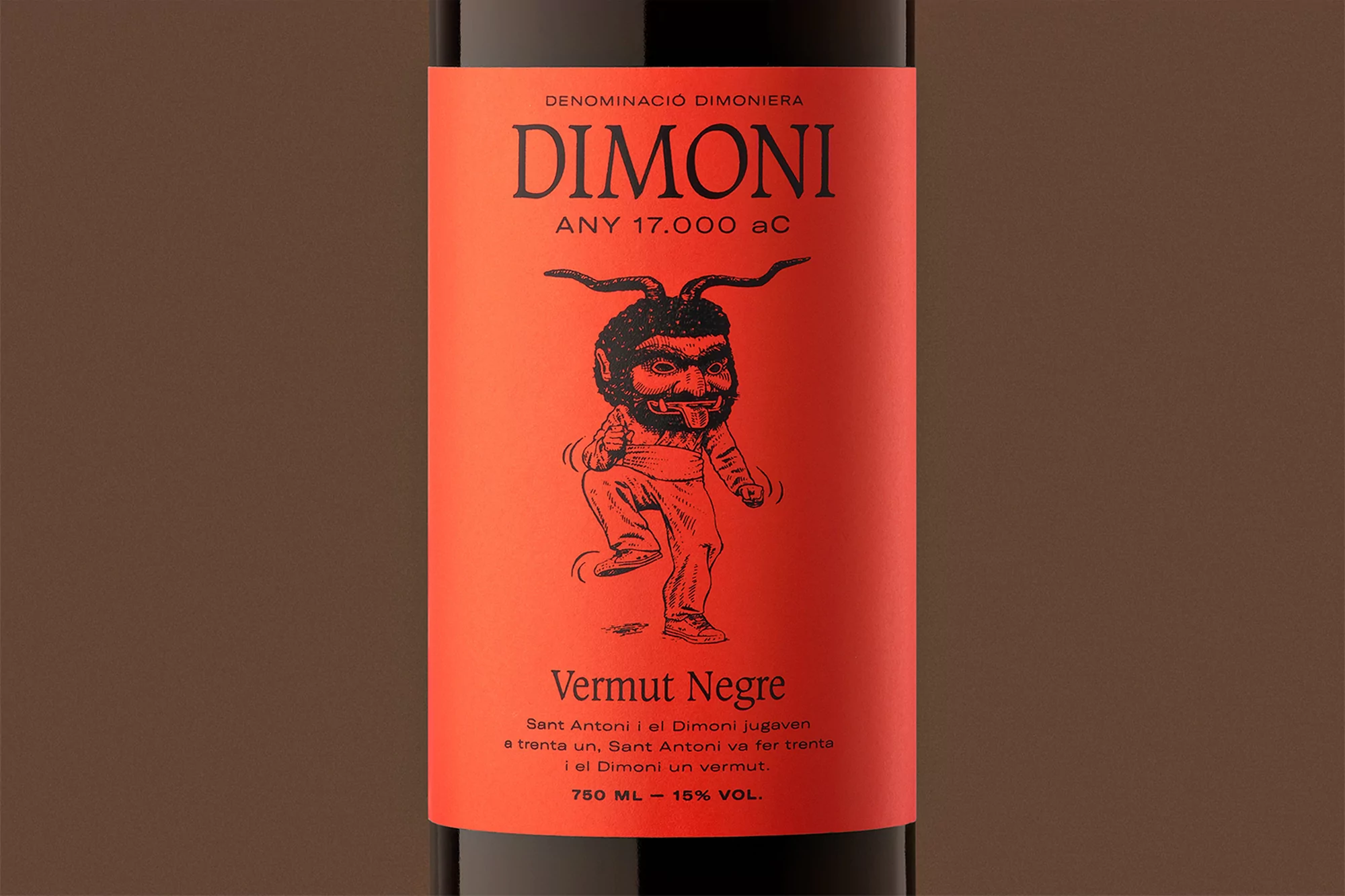 Red wine bottle label featuring an illustration of a demon in black ink. The label includes the name DIMONI and other descriptive text.