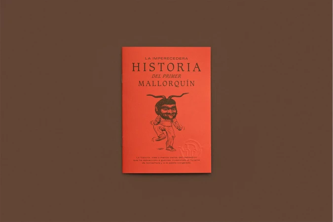 Front cover of 'La Imperecedera Historia del Primer Mallorquín' book featuring a drawing of a devil-like character in red tones.