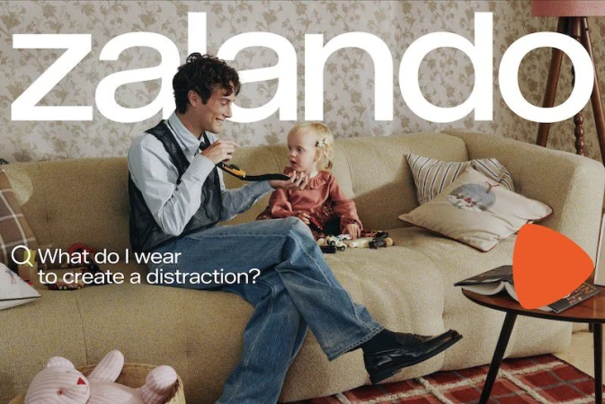 Father and daughter sit together on a couch with a toy, laptop, and basket; Zalando brand text overlay.