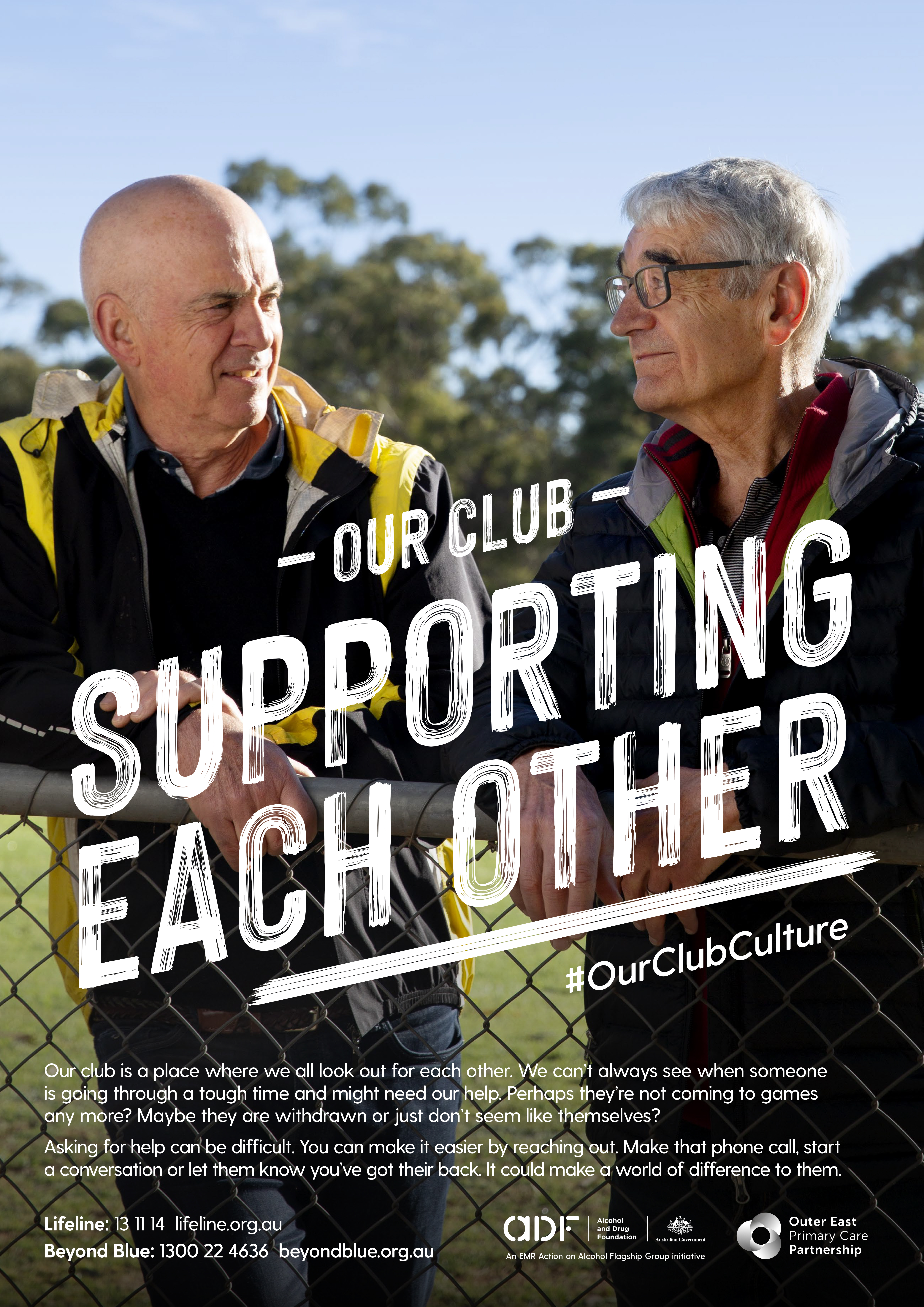 Two mature adult men stand together outdoors against a blurred green background; one wears glasses; a mental health awareness message is present.