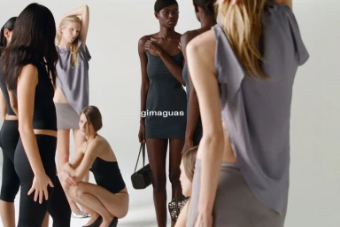 Group of female models wearing modern minimal apparel in a bright white studio setting for the Gimaguas SS26 campaign.