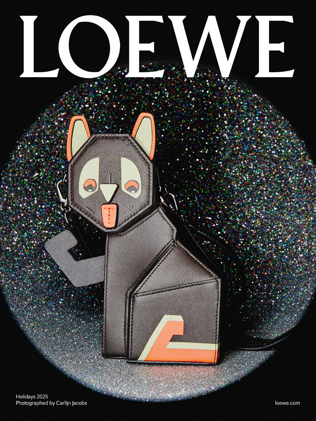 Loewe's Holiday 2023 campaign features a dog-shaped brown leather handbag with geometric detailing against a glittery black background.