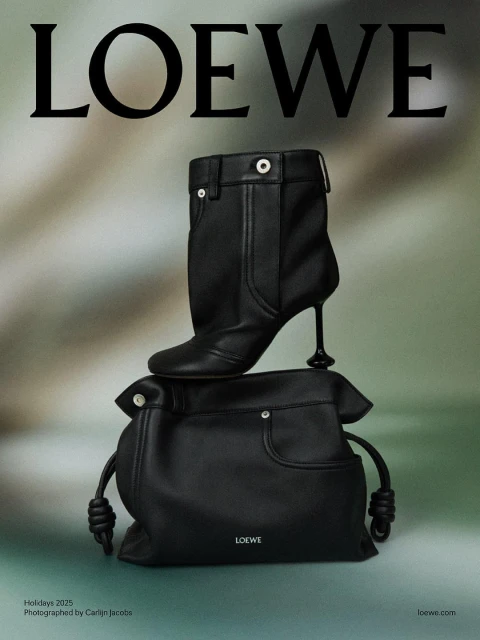 Loewe advertisement featuring a black leather handbag with drawstring and a matching heeled boot, set against a blurred backdrop.