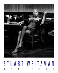 Keke Palmer seated in a restaurant booth wearing a corset dress and heels for the Stuart Weitzman Holiday 2025 campaign.