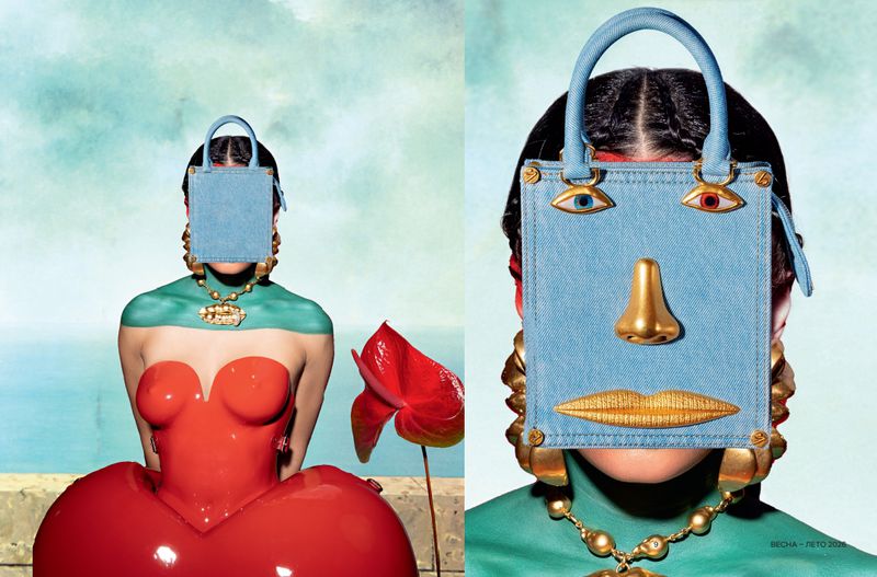 Two women with blue denim purses covering their faces, one wearing red and green body paint and the other wearing a green top and gold jewelry.