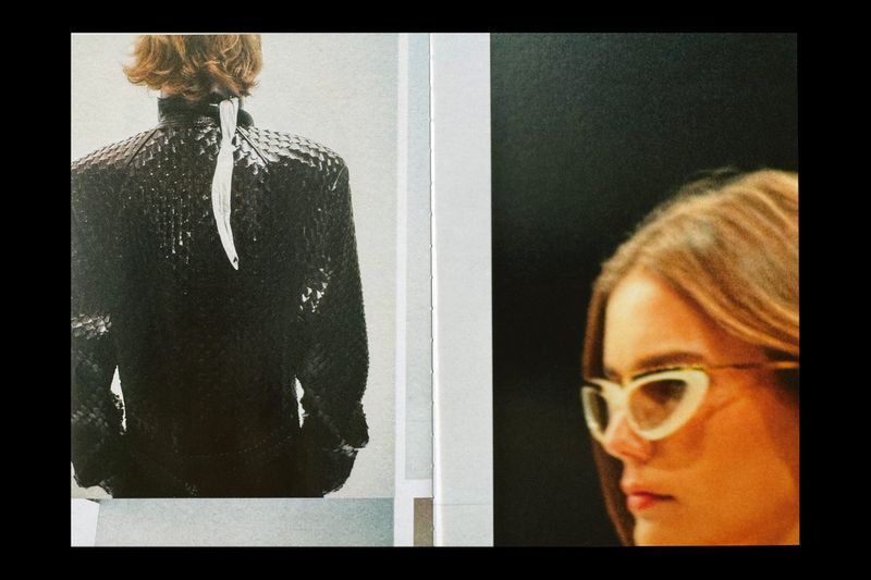 Fanzine spread showing a textured black jacket from the back and a close-up portrait of a woman wearing cat-eye glasses