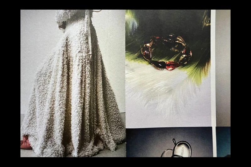 Textured fabric gown, amber bracelet detail, fashion editorial with textile focus, studio lit, and product photography aesthetics.