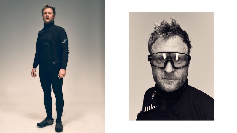 Man in athletic wear stands in a studio with black and white close up in sepia tones. He wears goggles and a black turtleneck.