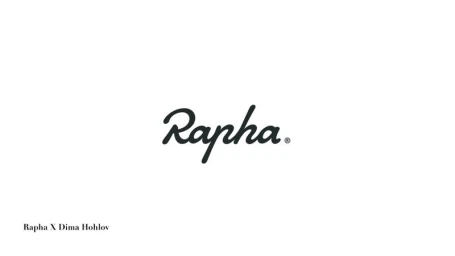 Minimalist white image featuring the black cursive Rapha brand logo centrally placed with small text in the bottom left corner