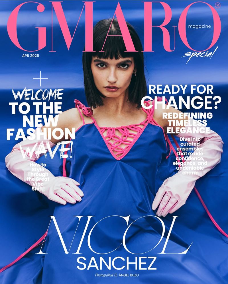 Magazine cover featuring a woman in a blue dress with pink accents, wearing pink gloves. The magazine is GMARO with a special edition.
