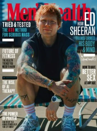 Men's Health magazine cover featuring Ed Sheeran sitting on a metal structure, wearing a black t-shirt, shorts, sneakers and socks.