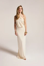 Chiara Ferragni wearing a white halterneck evening dress in a studio portrait for Cosmopolitan Turkey
