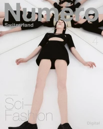 Model lying on white floor surrounded by angled mirrors reflecting multiple figures for Numéro Switzerland