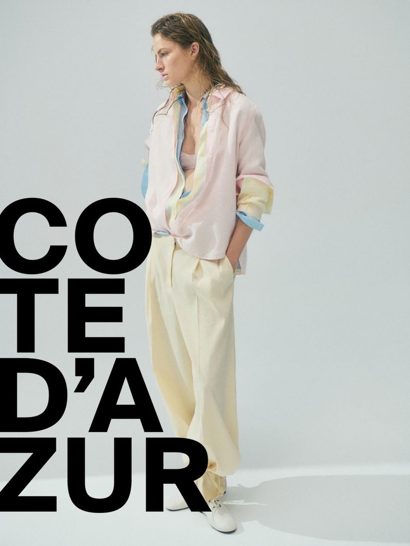 Model Felice Nova Noordhoff in layered pastel shirt and cream trousers against a white backdrop for Massimo Dutti