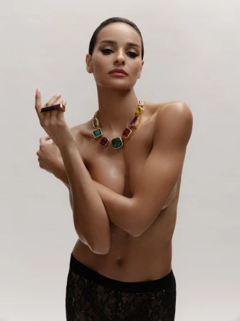 Model Gracie Carvalho wearing a statement multi-gemstone necklace and ring for Harpers Bazaar Serbia