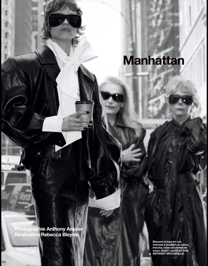 Fashion editorial shot in urban setting with three women in fashionable coats and sunglasses. Black and white image. Manhattan text.