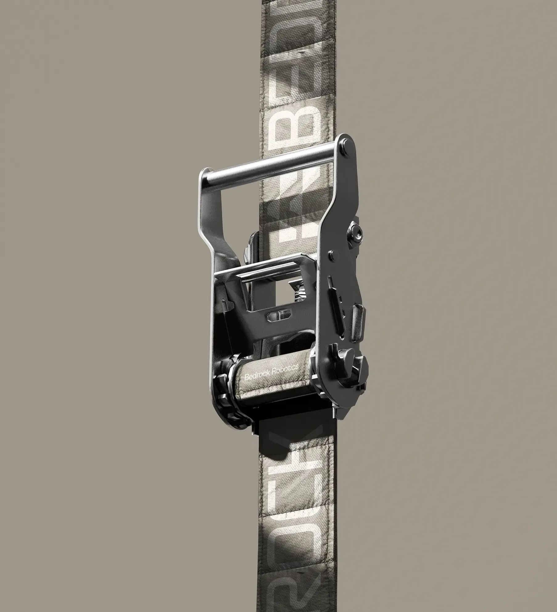 Ratchet strap close-up in a studio setting with neutral background. Metal mechanism and durable fabric for securing cargo and equipment.