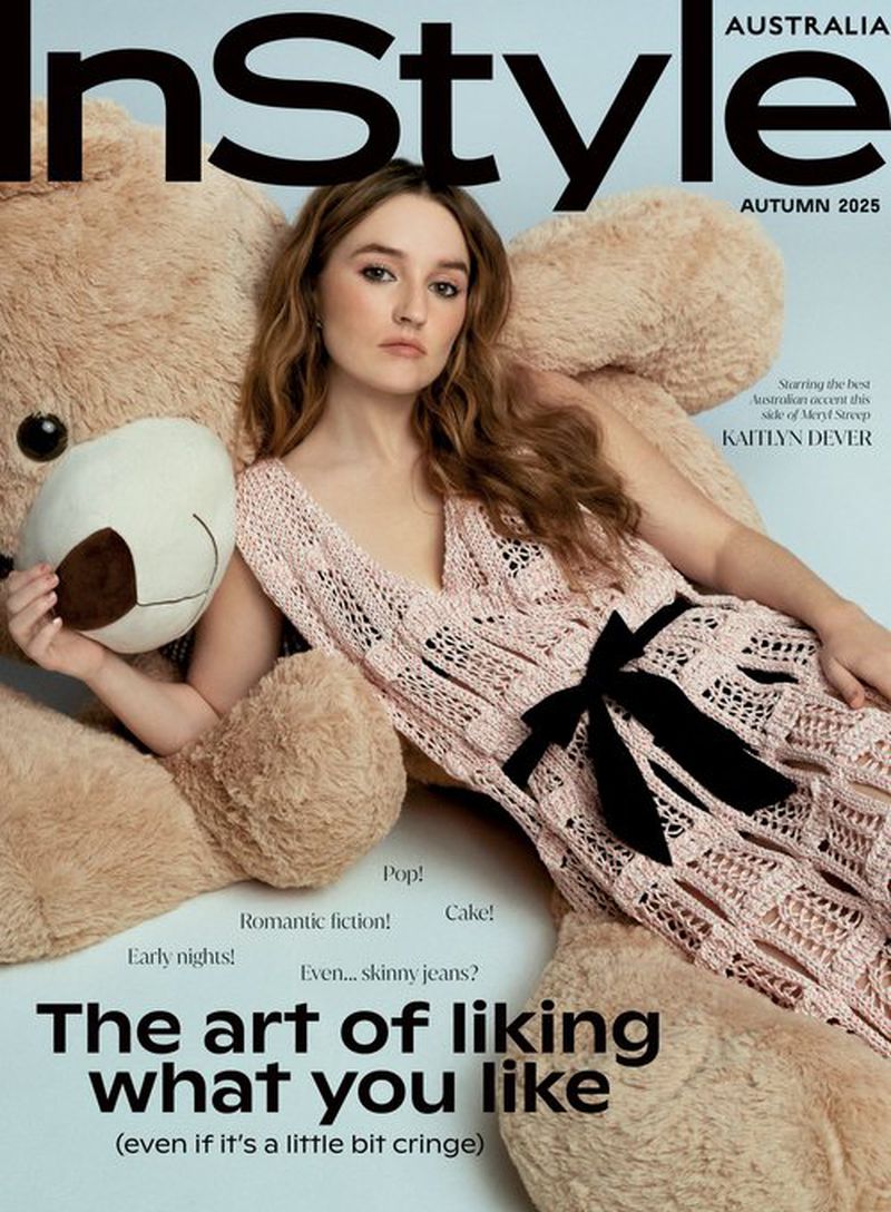 Magazine cover featuring Kaitlyn Dever in a pink dress, reclining against a large teddy bear with the InStyle Australia logo.