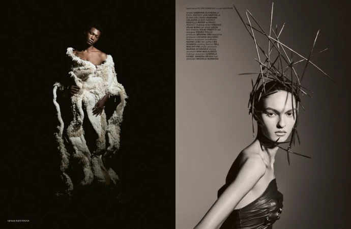 Fashion editorial shot featuring two women; one is wearing a large, textured white dress, and the other is wearing a black dress and headpiece.