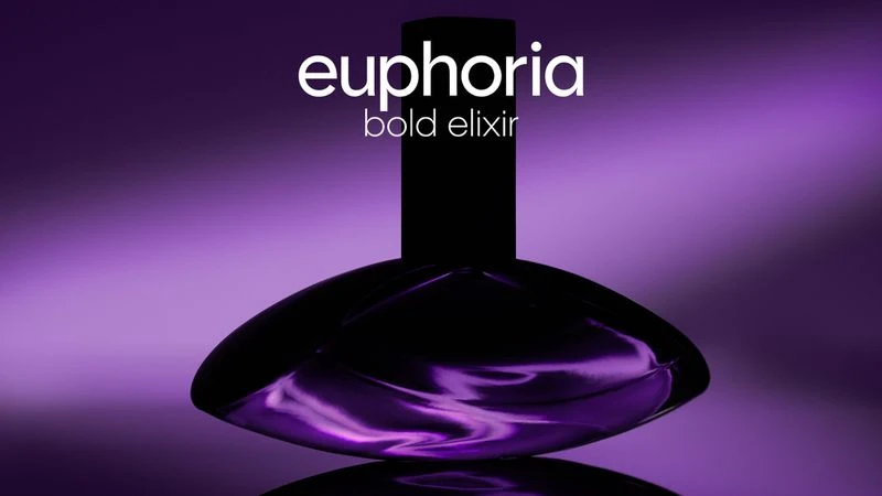 Euphoria Bold Elixir perfume bottle on a reflective surface with a purple gradient background, studio shot for beauty or fragrance.