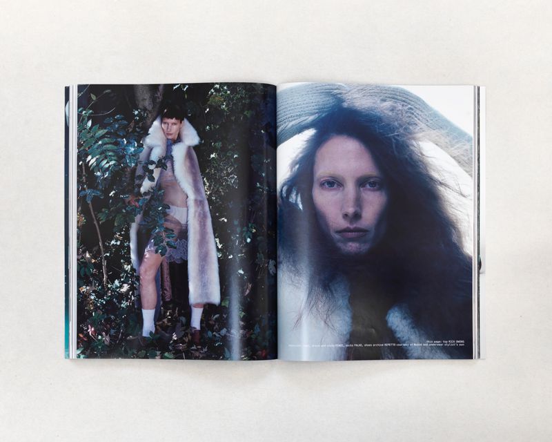 Magazine double-page spread features a model in a fur coat in a forest on one page and a close-up portrait on the other.