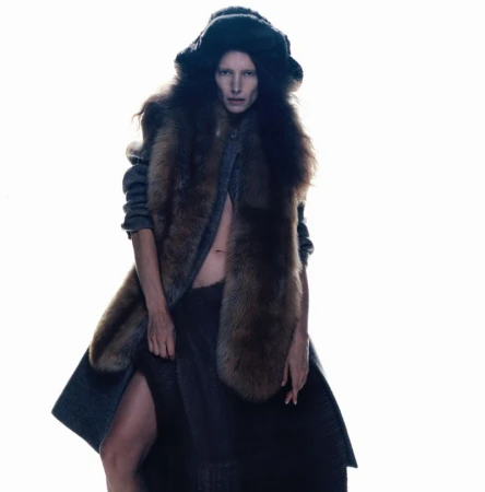 Model Jessica Miller wearing furry winter hat and coat in We All Go Down Together for The Face Magazine.