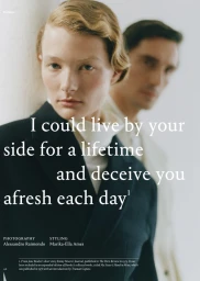 A woman and man posing in editorial fashion portrait with bold text overlay across image for AnOther Magazine story.