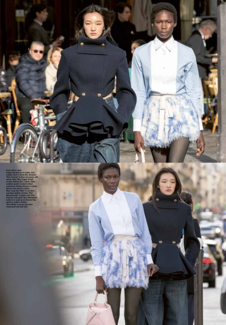 Two fashion models on city street wearing peplum jacket, skirt, button-down shirt, walking on the street with cars and buildings.
