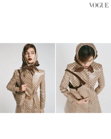 Fashion shot of a woman wearing a patterned trench coat, headscarf, and carrying a purse, photographed in a photo studio with 'Vogue' logo.