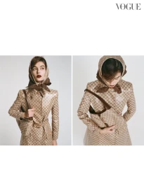 Model wearing a monogram coat and matching headscarf with a brown leather handbag against a plain white background