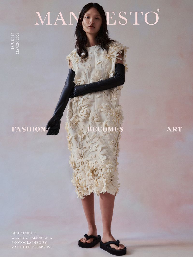 Fashion editorial image featuring an Asian woman in a floral-applique dress and long gloves, standing against a blended pink background.