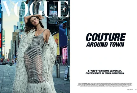 Phoebe Tonkin in a fringe coat and beaded dress on a city street for Vogue Australia