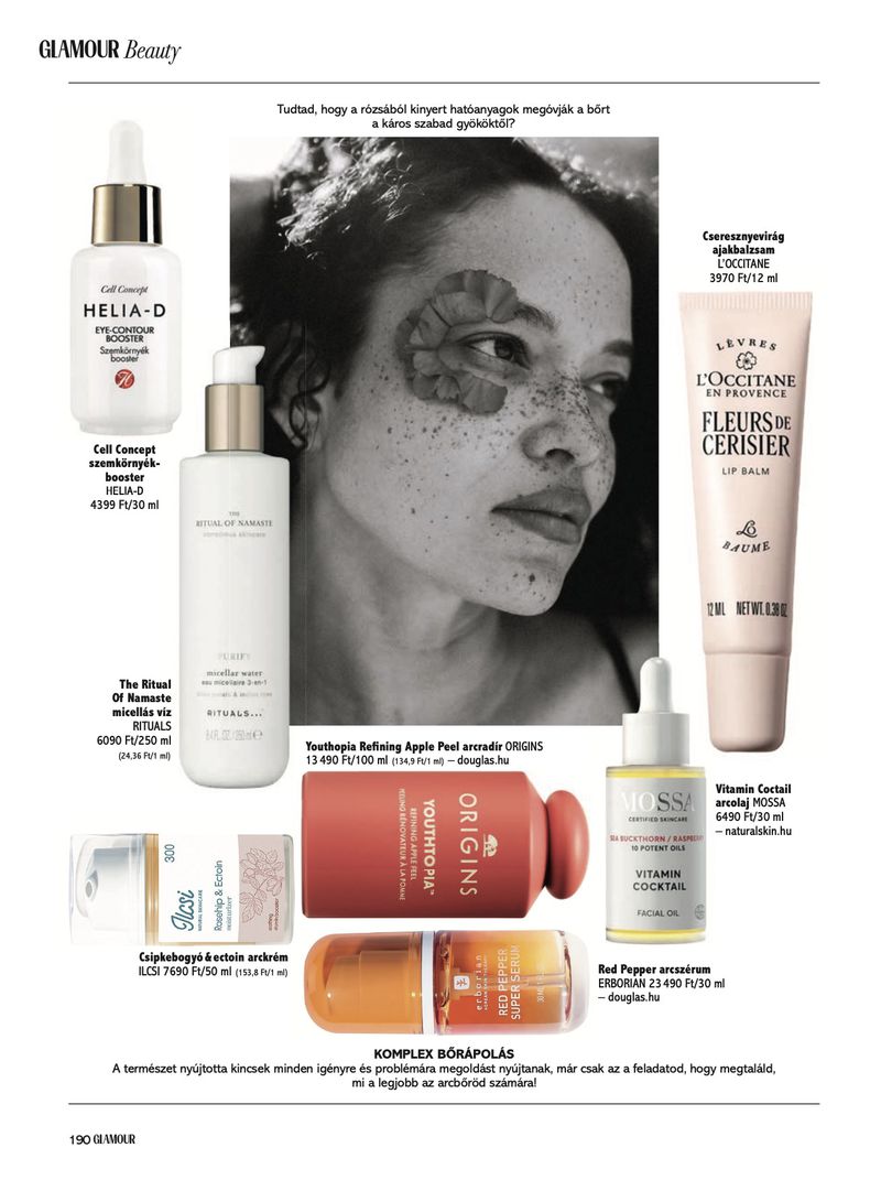 Cosmetic product advertisement featuring skincare bottles and a black and white portrait of a woman's face in a magazine.