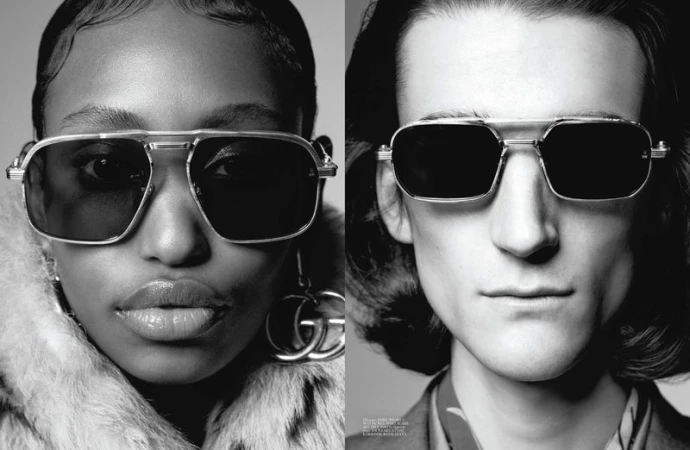 Close-up studio shot featuring two adults modeling black sunglasses with silver frames, the left side features a woman in a fur coat.