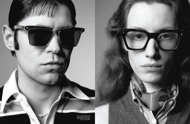 Close-up portrait of two models wearing dark sunglasses and patterned clothing against a neutral studio background.