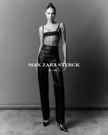 Model wearing a black top and high-waisted leather pants against a grey seamless backdrop for Max Zara Sterck