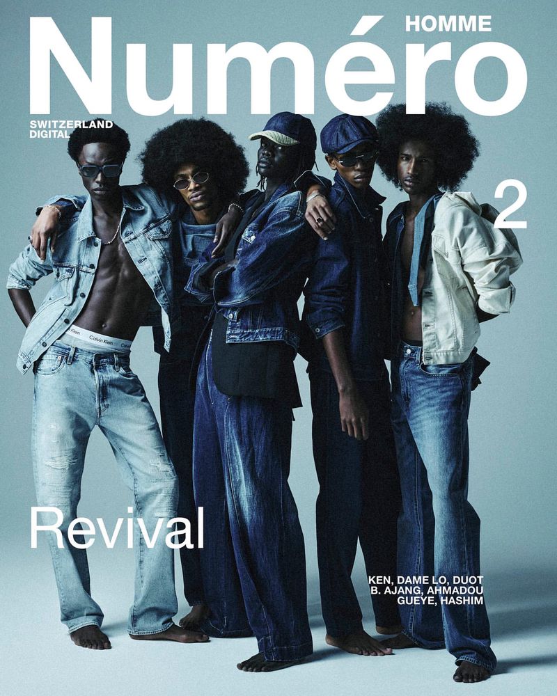 Magazine cover featuring five adult male fashion models in denim clothing, posed in a studio setting, promoting the 'Revival' issue.