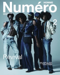 Five male models in denim clothing posing together against a plain grey studio backdrop for a digital magazine cover.