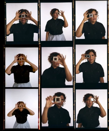 Contact sheet of nine portrait frames featuring a woman holding a small square slide frame in front of her eye for GQ Middle East.