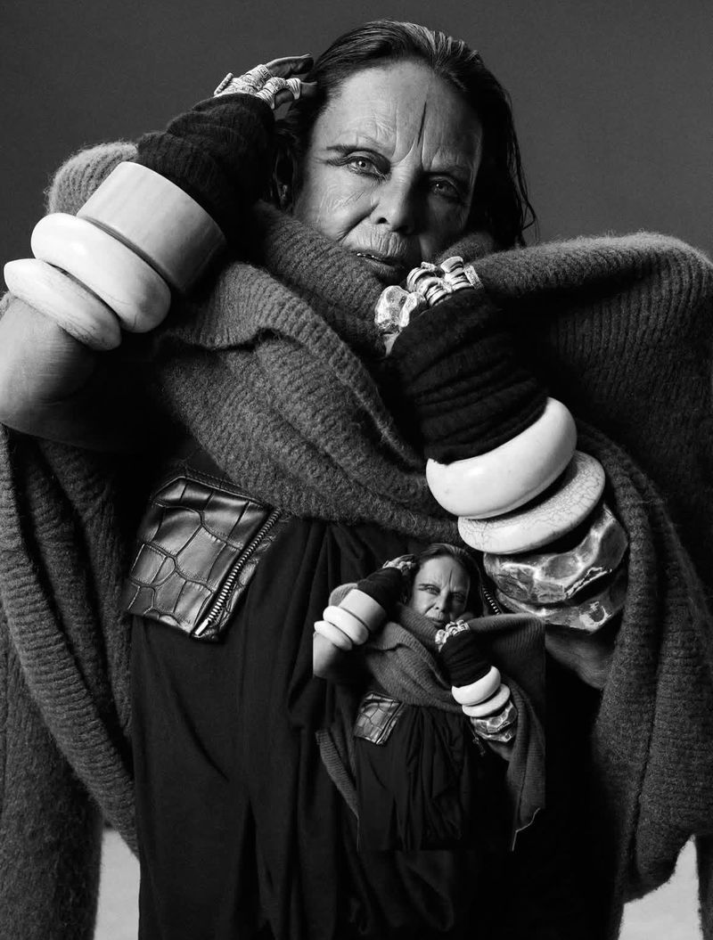 Artistic black and white portrait of a mature adult woman wearing jewelry and a large scarf, with a photo within a photo effect.