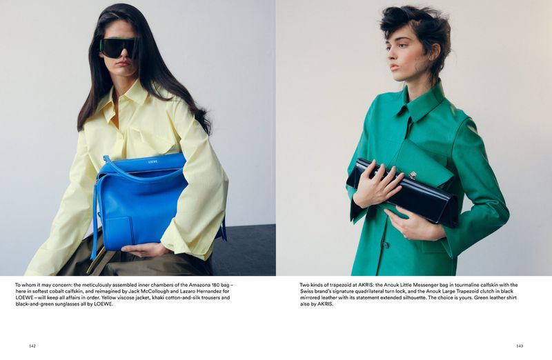 Editorial fashion shot featuring two women in green and yellow shirts, holding a blue Loewe handbag and black Akris clutch.