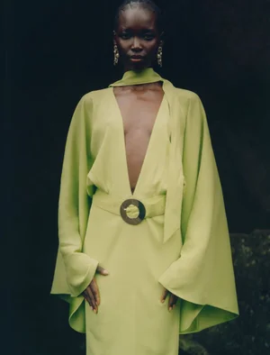 Model Amam Abit wearing a belted chartreuse dress in an editorial project for Blanc Magazine captured by Oliver Oglesby.