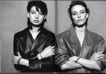 Black and white portrait of two women in leather jackets with crossed arms for Self Service by photographer Larissa Hofmann.