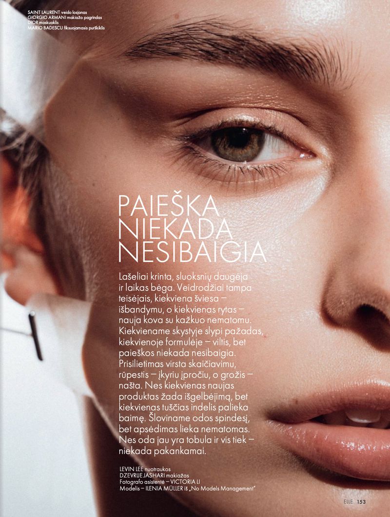 Close-up studio shot of a model's face with visible eye, skin texture, and lips, complemented by the soft, diffused lighting.