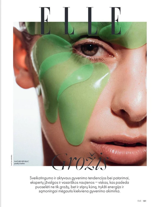 Close-up portrait of a model wearing green gel skincare masks over eyes and forehead for Elle Lithuania by Levin Lee.