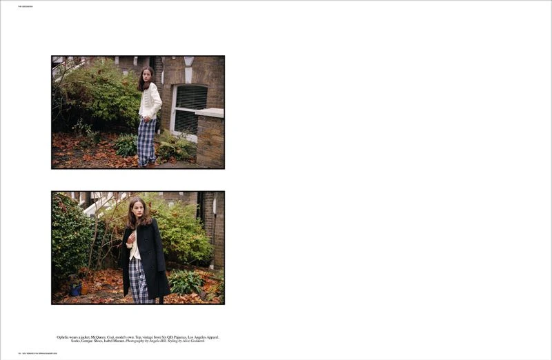 Editorial double-page spread featuring two framed photographs of a model outdoors in a garden setting wearing plaid trousers