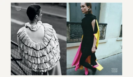 Two fashion models in styled garments outdoors on a street for Vogue Greece Blue dreams editorial.