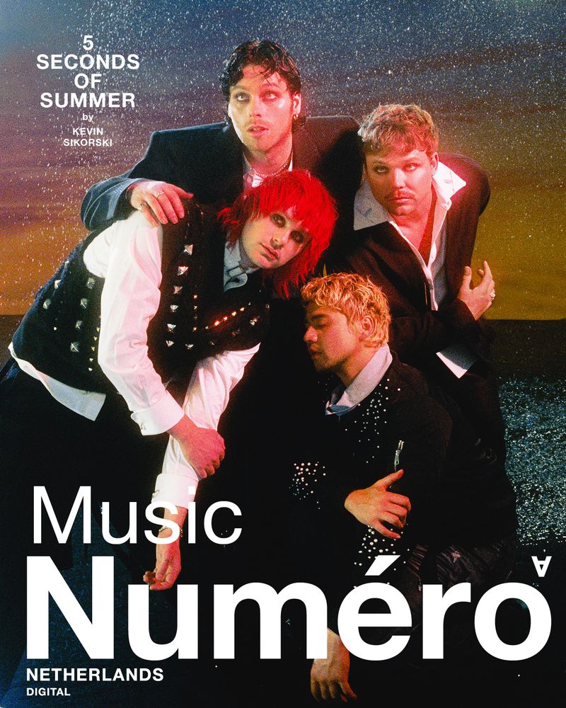Magazine cover featuring four members of the band 5 Seconds of Summer against a bokeh background with dominant text "Music Numéro."