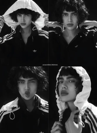 A fashion-forward, black-and-white collage featuring a woman with short curly hair in various poses, wearing an Adidas jacket, set against a dark backdrop.