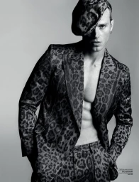 Matthew Noszka wearing a leopard print suit and matching cap for V Man photographed by Luigi and Iango